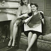 Two Women Sitting By Fireplace, Reading Newspaper, (b&w) Art Print