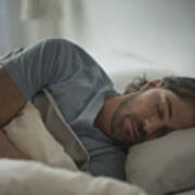 USA, New Jersey, Man sleeping in bed Art Print