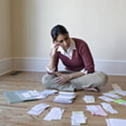 Woman Looking At Bills And Receipts On Floor Art Print