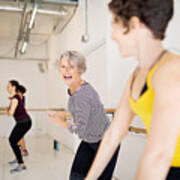 Women Enjoying A Dance Routine In Fitness Studio Art Print