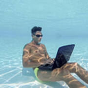 Young Man Using Computer Underwater Art Print