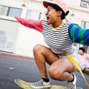 Young Woman Skateboarding Art Print