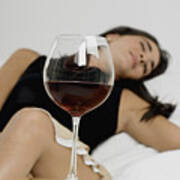 Young Woman Sleeping With Wineglasses In Front Of Her Art Print