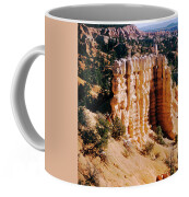 https://render.fineartamerica.com/images/rendered/small/sideright/mug/images/artworkimages/medium/2/1957-ponderosa-pine-trees-and-hoodoos-of-bryce-canyon-utah700-00104-kevin-russell.jpg?&targetx=148&targety=0&imagewidth=503&imageheight=333&modelwidth=800&modelheight=333&backgroundcolor=D8AF93&orientation=0&producttype=coffeemug-11