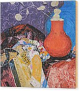 Red Vase Among Fabrics Wood Print