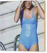 Patti Hansen Wearing A Blue Swimsuit Wood Print