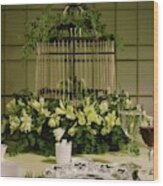 A Birdcage In The Middle Of A Table Wood Print