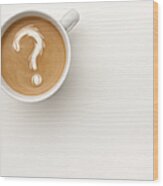 A coffee with a question mark drawn in the foam Wood Print