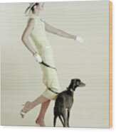 A Model Walking A Dog Wood Print