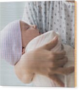 Asian Mother Holding Newborn Baby In Hospital Wood Print