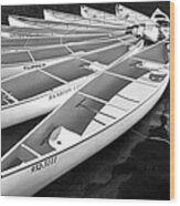 Black And White Photograph Of A Group Of Canoes Tethered Together In A Circle Wood Print
