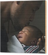 Black Father Kissing Forehead Of Newborn Son Wood Print