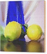 Blue Bottle And Lemons Wood Print
