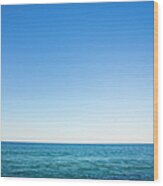Blue Sky And Sea Wood Print