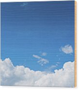 Blue Sky With Dramatic White Clouds Wood Print