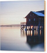 Boathouse In The Blue Wood Print