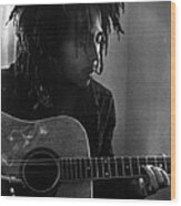 Bob Marley Leaning Over Guitar Wood Print