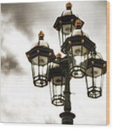 British Street Lamp Against Cloudy Sky Wood Print