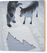 Bull And Bear Figurines On Descending Line Graph And List Of Share Prices Wood Print