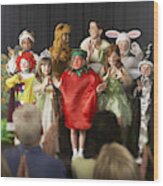 Children (4-9) Wearing Costumes And Teacher Waving On Stage Wood Print