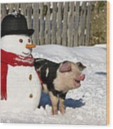Curious Piglet And Snowman Wood Print
