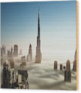 Dubai Skyline In Early Morning Fog Wood Print