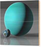 Earth Compared To Uranus Wood Print