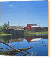 Farm Buildings And Pond. Wood Print