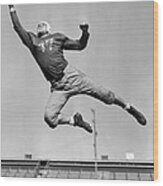 Football Player Catching Pass Wood Print