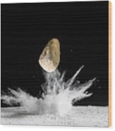 Impact Of Meteorite,  Rock Or Stone Of Fire On The Soil, Producing An Explosion And A Crater Of Powder On A Black Background. Spain Wood Print