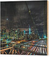 Leaving New York City Via The Brooklyn Bridge Wood Print