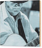 Male In Alpine Hat Playing Guitar Wood Print