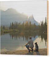 Man And Dog Beside Lake In Mountains, Rear View Wood Print
