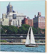 Manhattan - Sailboat Against Manhatten Skyline Wood Print