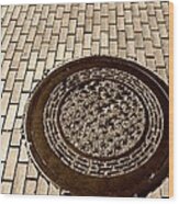 Manhole Cover And Bricks Wood Print