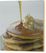 Maple Syrup Being Poured Onto A Stack Of Pancakes Wood Print