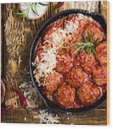 Meatballs In Sour Tomato Sauce With Grated Parmesan Cheese On Top Wood Print