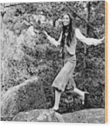 Model Jumps On A Rock Wearing Buckskin Knickers Wood Print