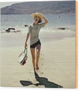 Model Wearing A Straw Hat On A Beach Wood Print