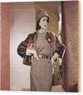Model Wearing Fur Jacket With Dress And Hat Wood Print