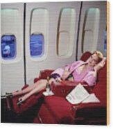 Model Wearing Pink Jacket On Airplane Wood Print