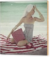 Model With A Polka Dot Bag On A Beach Wood Print