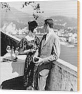 Models Holding Wine On A Balcony Wood Print