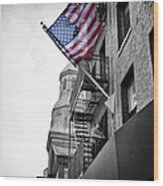 Old Glory Getting Raised Wood Print