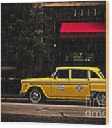 Old Yellow Cab In Rain Wood Print