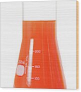 Orange Liquid In A Conical Flask Wood Print