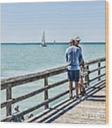 Relaxing At Naples Pier Wood Print
