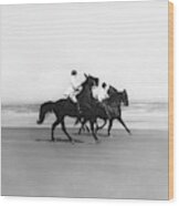 Riding Horses On The Beach Wood Print