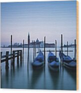 Row Of Gondolas At Sunrise In Venice Wood Print