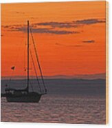 Sailboat At Sunset Wood Print